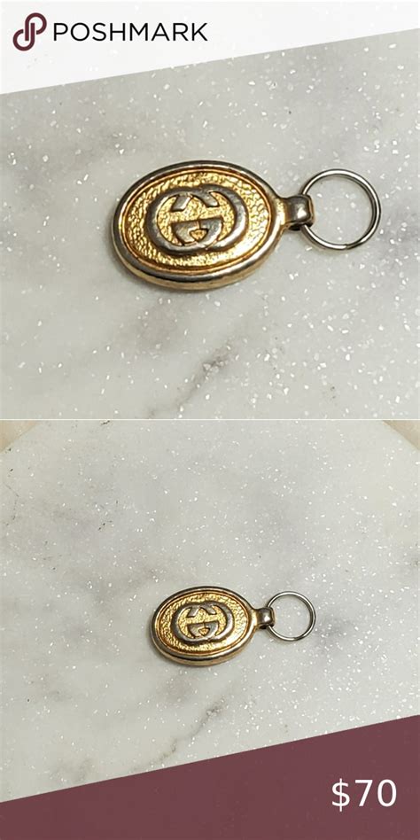 gucci g zipper pull